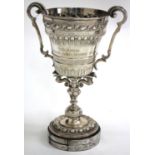 AN EARLY 19TH CENTURY SCOTTISH SOLID SILVER CUP of campana form with twin scrolling handles,