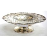 A SILVER CIRCULAR FOOTED BOWL in the form of a flower head, marks for Mappin and Webb 15.5cm