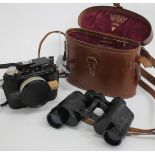 A NIKKOR CALYPSO CAMERA together with a pair of binoculars in a leather case by 'Wray of London' (