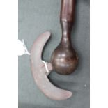 AN AFRICAN TRIBAL HARDWOOD BATTLE AXE with a half moon steel head 96cm in length