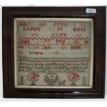 AN ANTIQUE ALPHABET SAMPLER worked by Elizabeth Hatton, aged 9 year old, with flowers and a basket