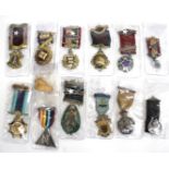 A LARGE COLLECTION OF EARLY 20TH CENTURY MASONIC MEDALS some in silver gilt