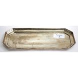 A RECTANGULAR SILVER PEN TRAY with canted corners and retailers mark for Payne & Son., 22.9cm wide