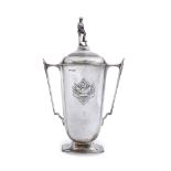 AN EARLY 20TH CENTURY SILVER GARDENING TROPHY of vase form with twin handles and a cover mounted