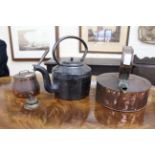 AN OLD COPPER KETTLE together with a small copper saucepan and lid, an iron kettle, an oak wall