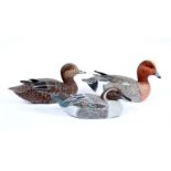 TWO HAND PAINTED WOODEN DECOY WIDGEON DUCKS, 35cm in length, a further modern handpainted decoy duck