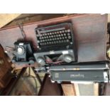 AN AEP BAKELITE TELEPHONE and an Imperial typewriter (2)