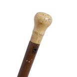 AN ANTIQUE IVORY TOPPED WALKING CANE 80cm in length