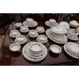 AN EXTENSIVE ROYAL DOULTON BURGUNDY TC1001 TABLE SERVICE including dinner plates, soup bowls,