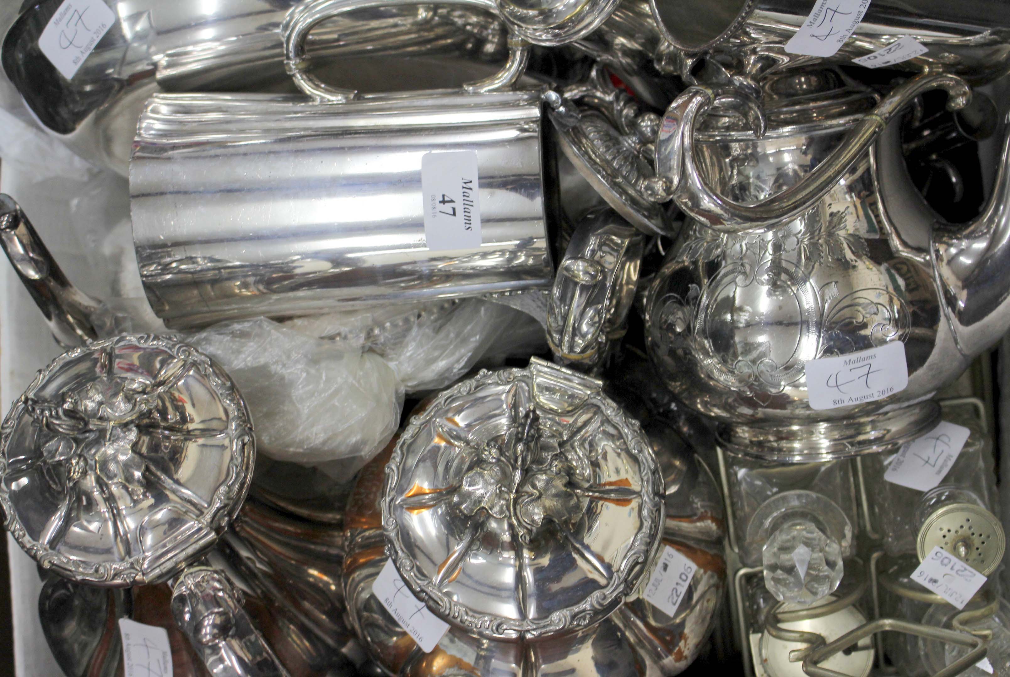 A QUANTITY OF SILVER PLATE to include tea and coffee pots, entree dishes, a table centre etc.