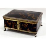 A GEORGE V TORTOISESHELL & SILVER MOUNTED JEWELLERY CASKET of rectangular form with lifting lid