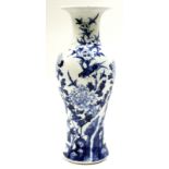 A CHINESE BLUE AND WHITE BALUSTER VASE 19th Century, birds, peony and rockwork 30cm