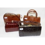 A GROUP OF FOUR VARIOUS CROCODILE SKIN HANDBAGS the largest 26.5cm wide