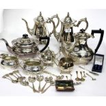 A SELECTION OF SILVER PLATED VICTORIAN STYLE TEAPOTS milk jugs, sugar bowls etc. and a selection