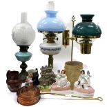 TWO VICTORIAN OIL LAMPS together with a further oil lamp, three Staffordshire flatback figures, a