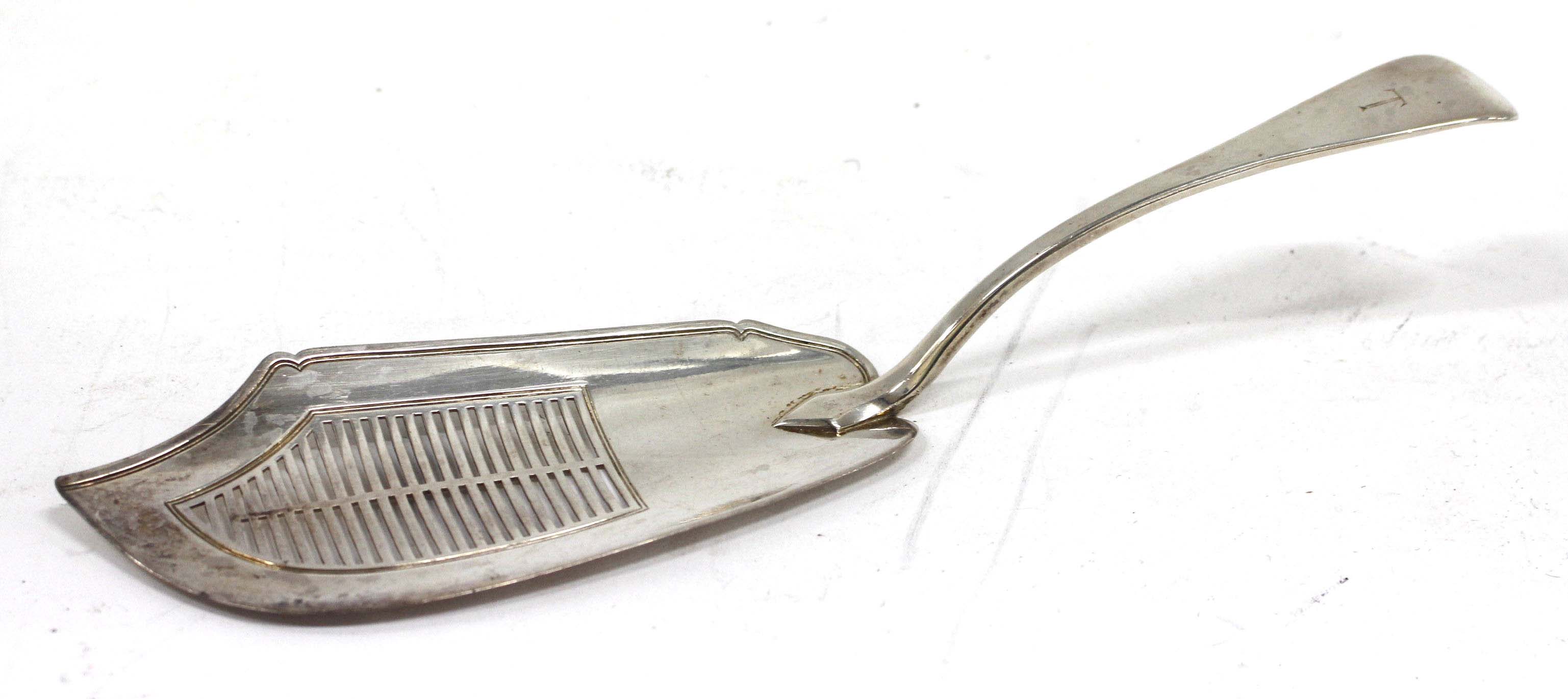 A GEORGE III OLD ENGLISH PATTERN FISH SLICE with pieced blade, marks for London and makers mark W.K.