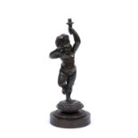 A VICTORIAN CAST BRONZE LAMP BASE in the form of a putti holding a torch aloft, on a cast circular