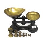 A SET OF LIBRASCA ENGLISH IRON BALANCE SCALES and a set of seven bell weights
