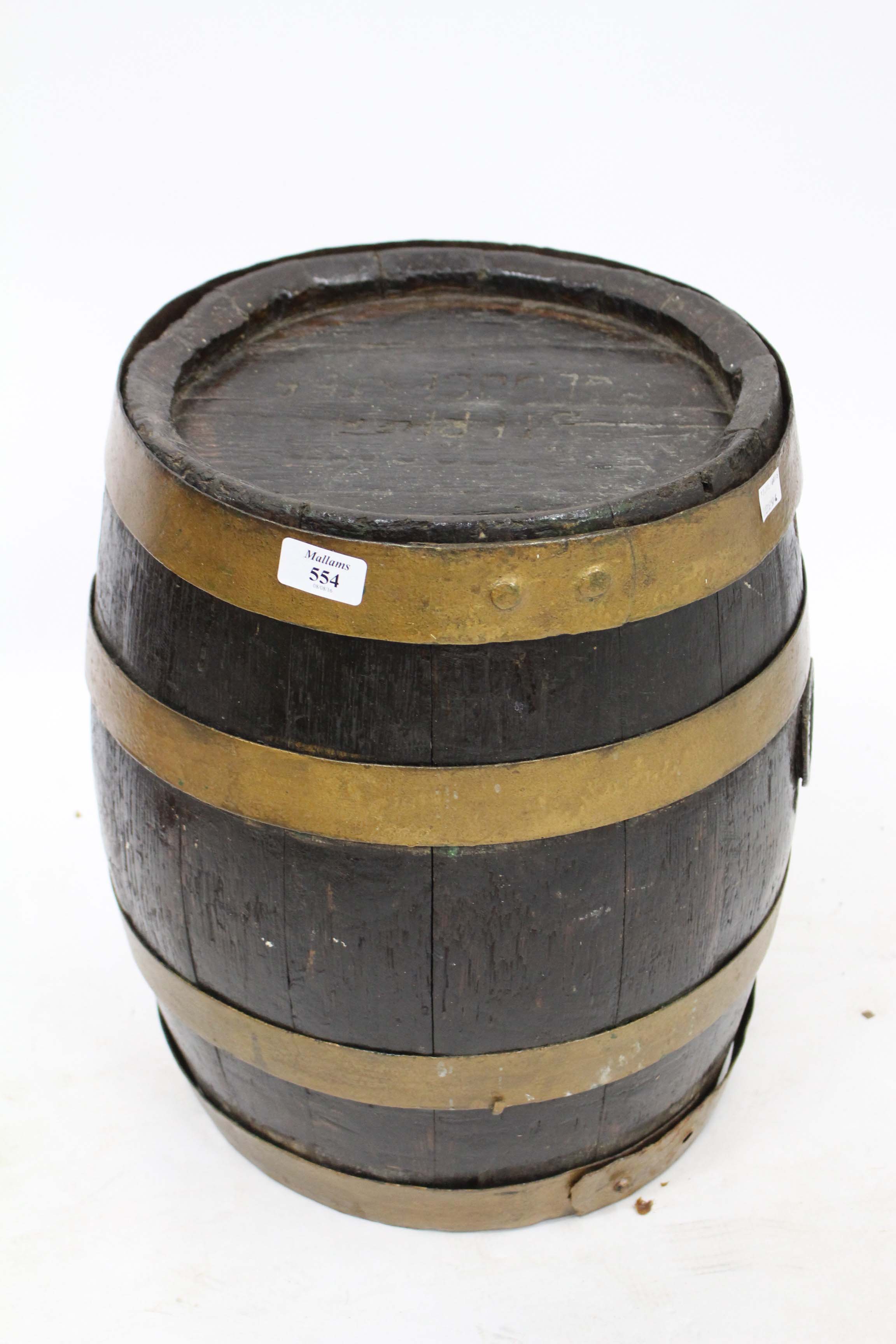 AN ANTIQUE COOPERED BEER BARREL 38cm wide