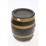 AN ANTIQUE COOPERED BEER BARREL 38cm wide