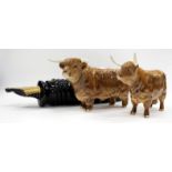 TWO BESWICK HIGHLAND CATTLE FIGURES and a desk stand in the form of a Parker Pen by The Parker Pen