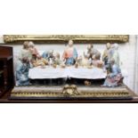 A LARGE CAPO DI MONTE PORCELAIN FIGURAL GROUP depicting The Last Supper by B. Merli, 91cm x 42cm