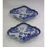 A PAIR OF 19TH CENTURY BLUE AND WHITE PEARL WARE LOZENGE SHAPED DISHES decorated in the willow