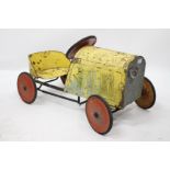 AN EARLY 20TH CENTURY YELLOW PAINTED PEDAL CAR 82cm in length