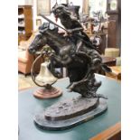 AFTER FREDERICK REMINGTON - A BRONZE FIGURE of a native American Indian on horseback on marble