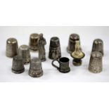 A COLLECTION OF SIX SILVER AND OTHER THIMBLES ETC (11)