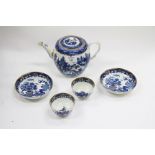 A PAIR OF EARLY WORCESTER BLUE AND WHITE TEA BOWLS and saucers and a similar teapot