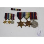 A TRIO OF WWII MEDALS to include a 1939 to 1945 star, the Atlantic star and a Defence medal with