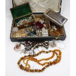 A GREEN LEATHER BOX containing an assortment of costume jewellery, London silver dressing table