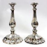 A PAIR OF VICTORIAN SILVER PLATED CONVERTED CANDLE STICKS with Monarch's head stamp and engrave