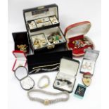 A SELECTION OF COSTUME JEWELLERY including a leather jewellery casket containing numerous sets of