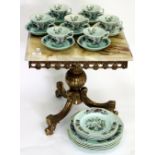 AN ADAMS MING JADE CUP AND SAUCER TEA SET and an onyx and brass gilt side table, 45cm x 46cm