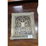 A 19TH CENTURY PIERCED BRASS FILIGREE PLAQUE, 22cm x 26cm