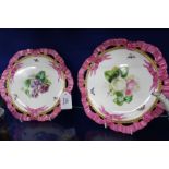 A PAIR OF VICTORIAN PORCELAIN CABINET PLATES with pierced pink ribbon tied edge and gilt beaded