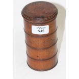 A CYLINDRICAL FOUR SECTION SPICE CONTAINER, 15cm high