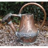 AN 18TH CENTURY FRENCH COPPER WATERING CAN, 51cm high