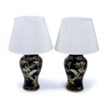 A PAIR OF BLACK GROUND PAPIER MACHE TABLE LAMPS of baluster form with chinoiserie decoration, each