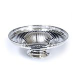 A GEORGE VI SILVER CIRCULAR DISH with pierced galleried edge and fluted bowl on a circular spreading