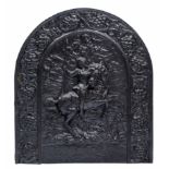AN ANTIQUE CAST IRON FIRE BACK of arching form, centrally decorated with St George and the dragon
