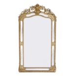 A 19TH CENTURY FRENCH GILT OVERMANTLE MIRROR, the shaped central mirror plates surrounded by