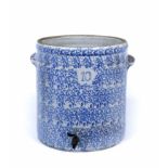 AN ANTIQUE CYLINDRICAL STONEWARE VESSEL with sponged decoration in blue, numbered '10', carrying