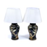 A PAIR OF BLACK GROUND PAPIER MACHE TABLE LAMPS of baluster form with chinoiserie decoration, each