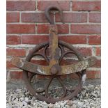 A LARGE 19TH CENTURY CAST IRON PULLEY BLOCK, 53cm wide x 64cm high overall