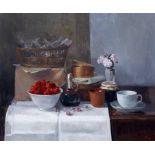 PAMELA KAY (b.1939) Still life of a cup and saucer, glasses, flowers and strawberries in a bowl, oil