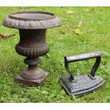 A MINIATURE CAST IRON PEDESTAL URN with fluted decoration on square plinth, 21cm high and an antique