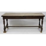 LATE 18TH / EARLY 19TH CENTURY FRUITWOOD DINING TABLE with three plank top on turned tapering legs